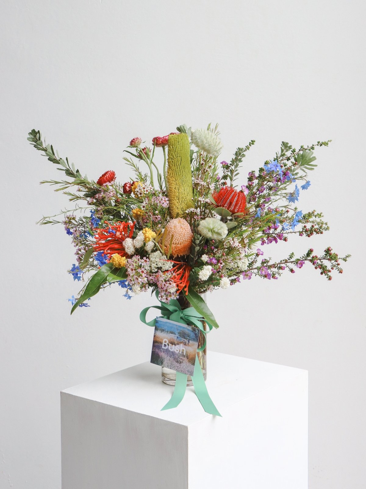 Small australian native flower bouquet in glass vase