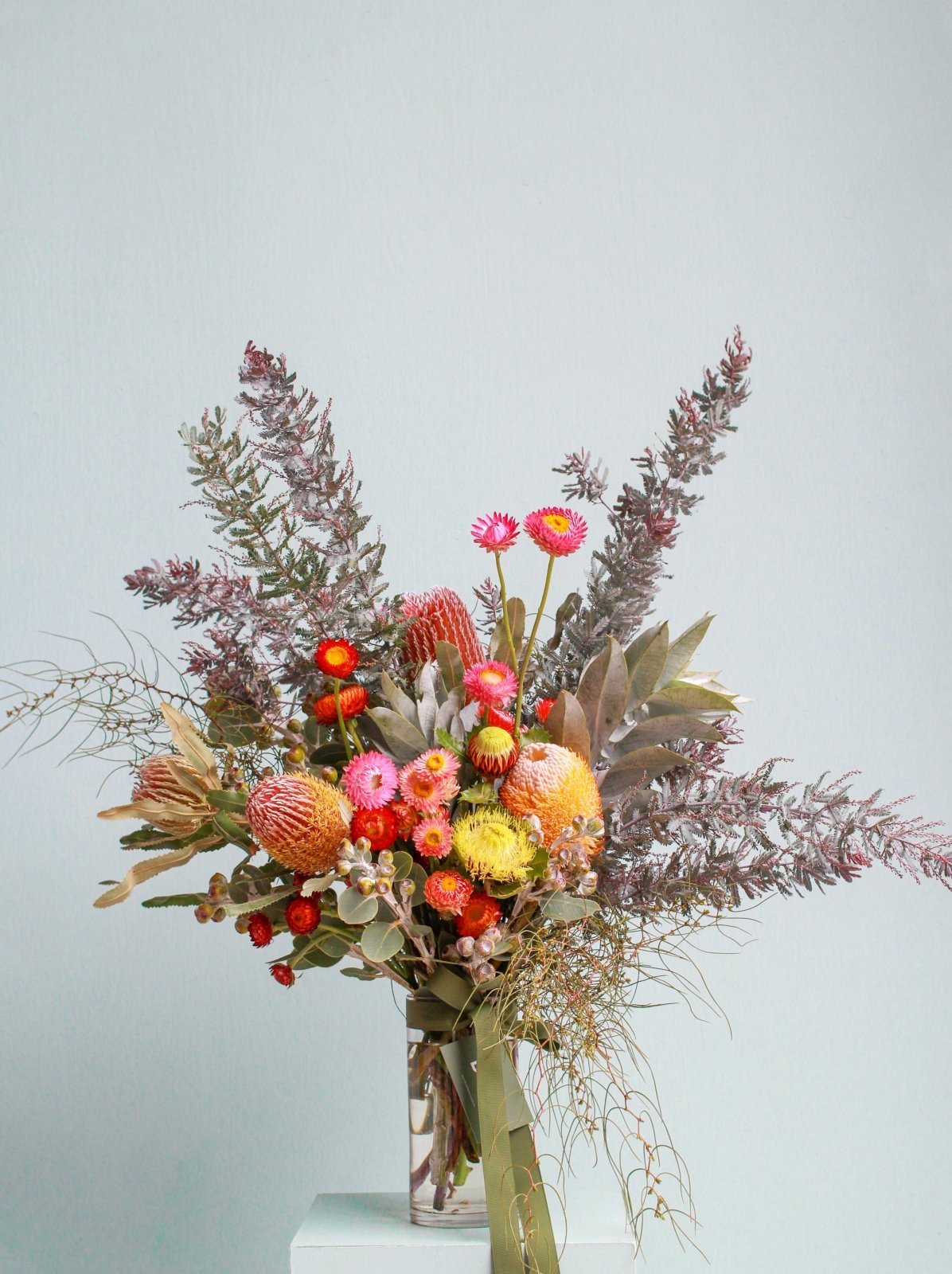 Large size bouquet of native flowers in a vase